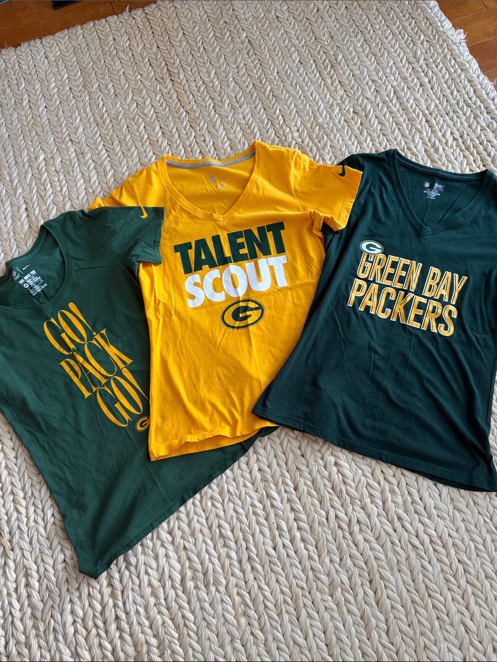 Bundle of women’s Nike Green Bay Packer T-shirts.